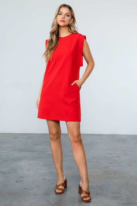 Women's Sleeveless dress in red. Fabric Content: 80% Polyester, 16% Rayon, 4% Spandex