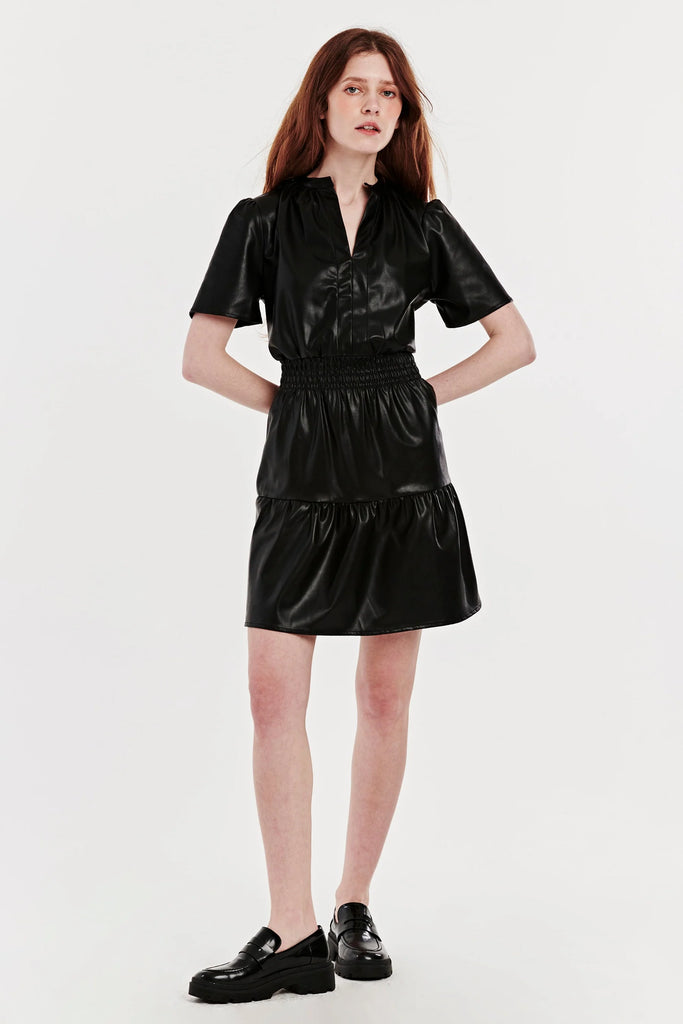 Smock Waist Dress in Black Vegan Leather on model front view 