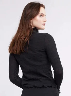 The Morgan 2nd Skin Top is designed to provide optimum comfort and fit. Constructed with spandex, this top hugs the curves of your body for a flattering, sexier shape. Its fitted turtleneck fabric ensures maximum comfort and flexibility.