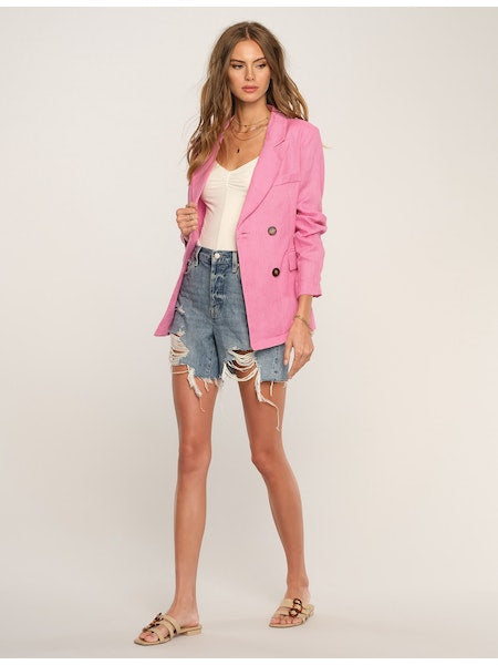 Women's Pink Linen Blazer. The Joanie Blazer is perfectly relaxed and made of our easy stretch suiting. Relaxed in fit, it has horn buttons along the front. Throw it on over a simple jeans and tee for a polished look. Fabric Content: 100% Linen