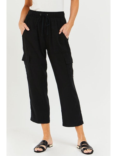 Women's Lunay pants in black. Pull on, elastic drawstring waist crop cargo pant, large front porkchop pockets