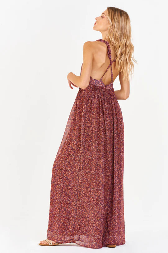 Women's Maxi Dress. Elia halter maxi dress in Terracotta palm color. Deep overlap v-neck with petal cross back straps & empire waist finished in contemporary palm print. Fabric Content: 100% Polyester