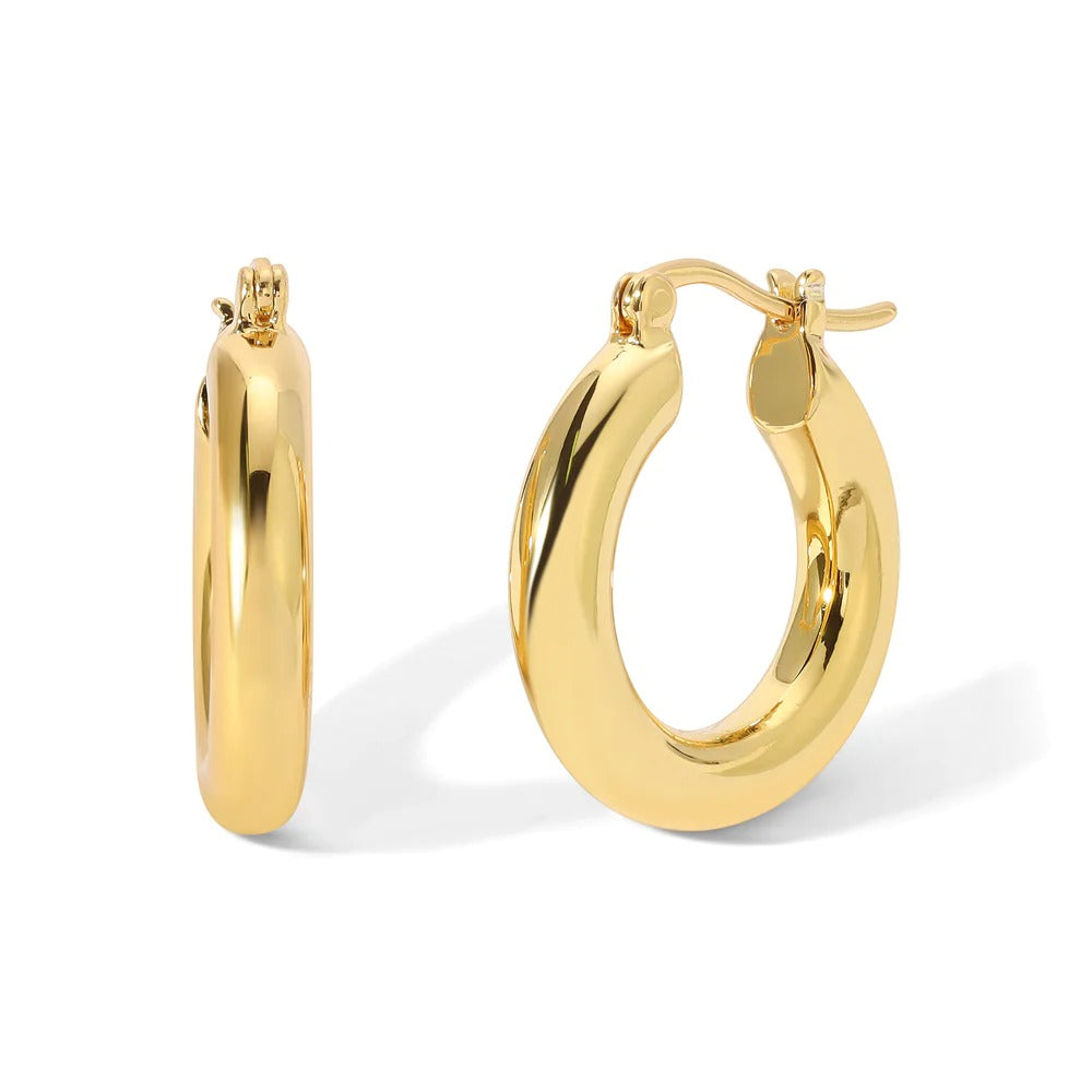 Gigi Midi Hoop Earring. Our Best-selling silhouette now in a midi hoop! These thick gold hoops are perfect for your ear party. 
