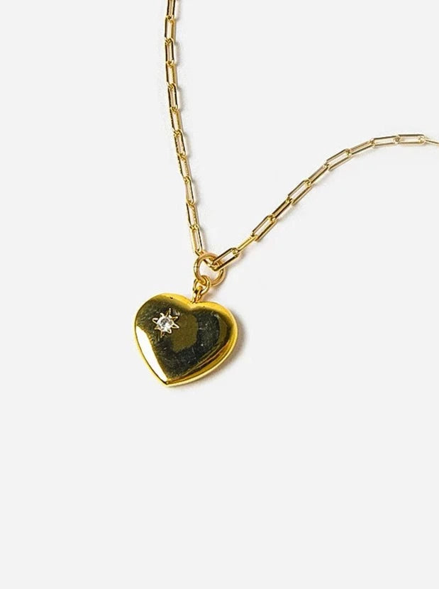 Heart of Gold Necklace. 14-karat gold-plated necklace with a heart pendant and single cubic zirconia stone. Features: Rectangle Link Chain Clasp Closure Heart Pendant with Cubic Zirconia Stone 14k Gold Plated Brass