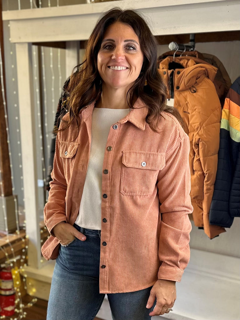 Meet your everyday layer—this super soft corduroy shacket is equally soft, cozy and warm. Details include front flap pockets and metal buttons..