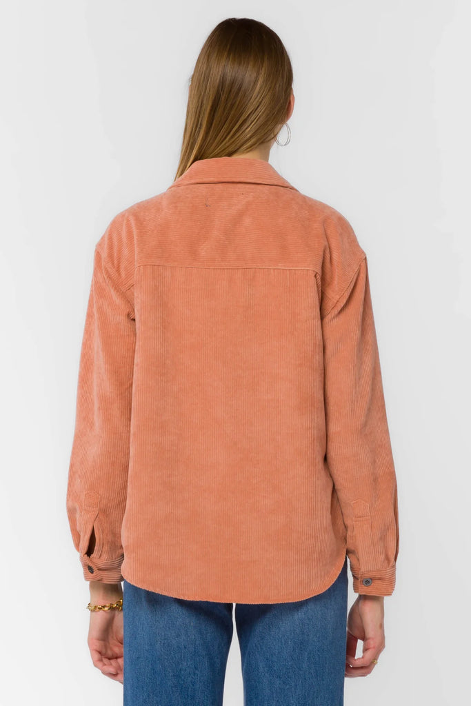 Meet your everyday layer—this super soft corduroy shacket is equally soft, cozy and warm. Details include front flap pockets and metal buttons..