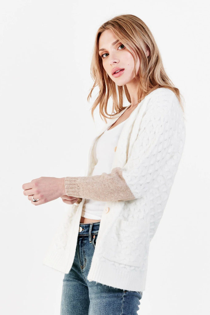 Callie contrast sleeve cardigan sweater in cream on model side view