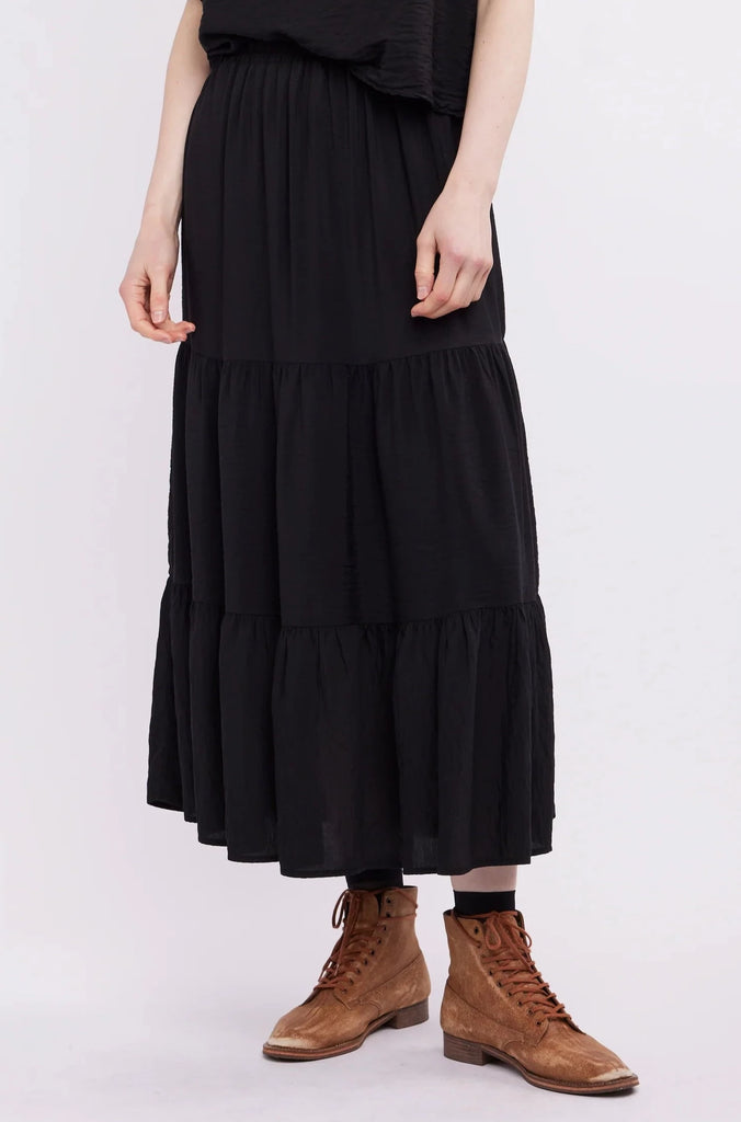 The Charlie Tiered Skirt is a versatile addition to your wardrobe. Its layered design makes it both comfortable and chic, perfect for transitioning from day to night. Made from high-quality materials, the tiered skirt is sure to become your go-to item. Dress it up or down for any occasion.