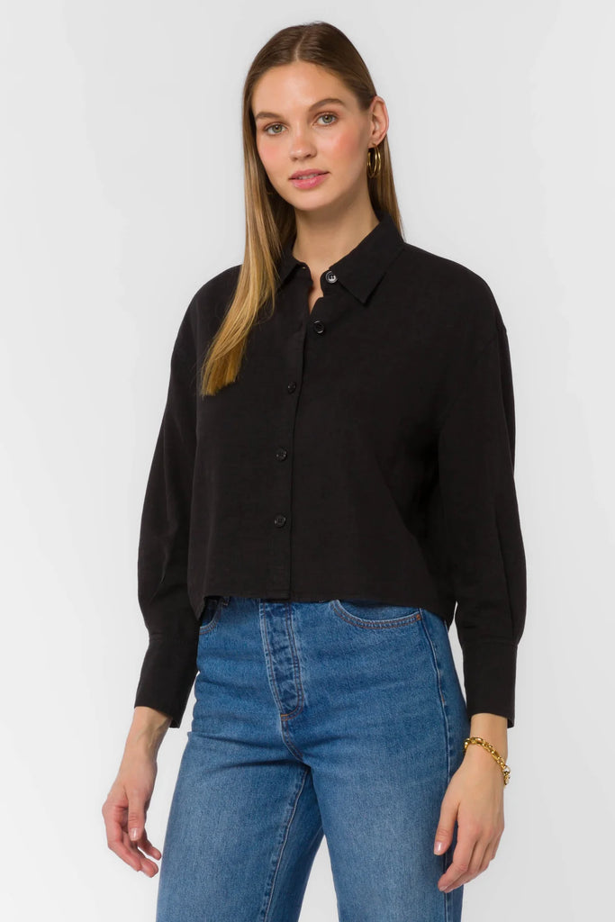 This Summerlyn Shirt adds a timeless style to your wardrobe. Featuring a button-up and long cuffed sleeves, this shirt keeps you looking sharp and professional. It also has a cropped collar, giving you a touch of modern sophistication.