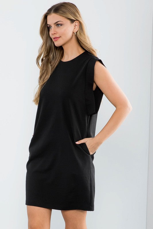 Women's Sleeveless dress in black. Fabric Content: 80% Polyester, 16% Rayon, 4% Spandex