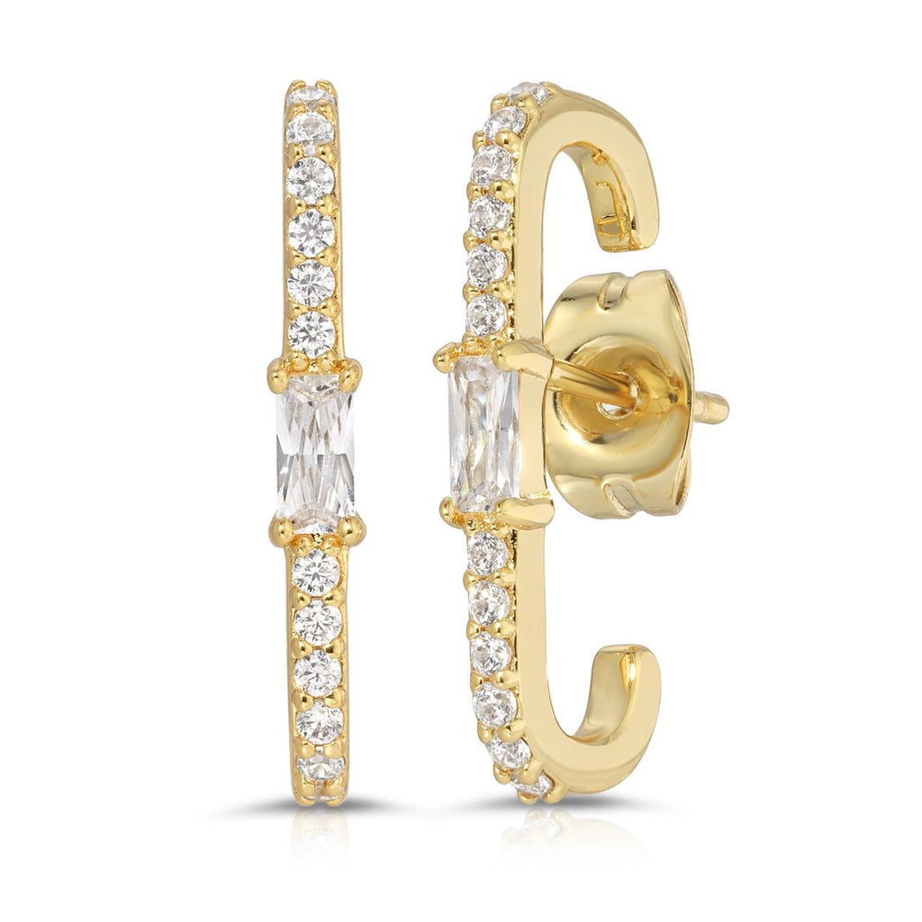 Rayna Earlobe Cuff Earring. An elevated earring perfect for multiple piercings. These cuff-style posts are designed to wrap around your lobe. Set with sparkling CZ stones with 14K gold-plated brass.
